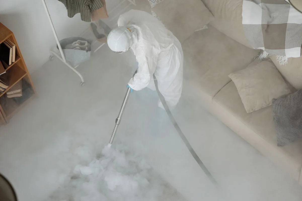 Biohazard cleanup technician in protective equipment, North Vacherie, LA
